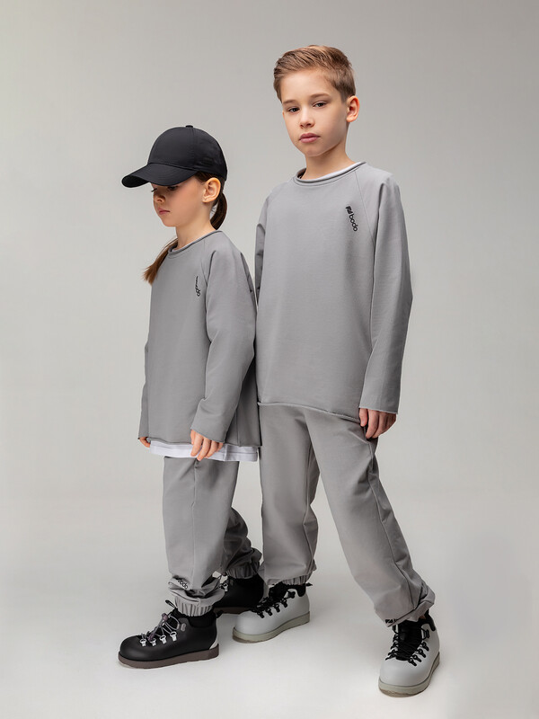 Костюм с необработанными краями