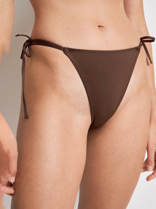 Трусы купальные стринги-бразилиано жен. Antorina